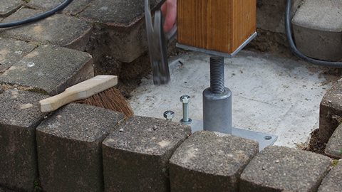 Fixation au sol pour toit de terrasse