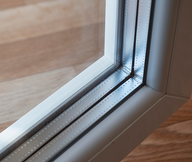 Dreifachverglasung Detailaufnahme mit Fensterrahmen