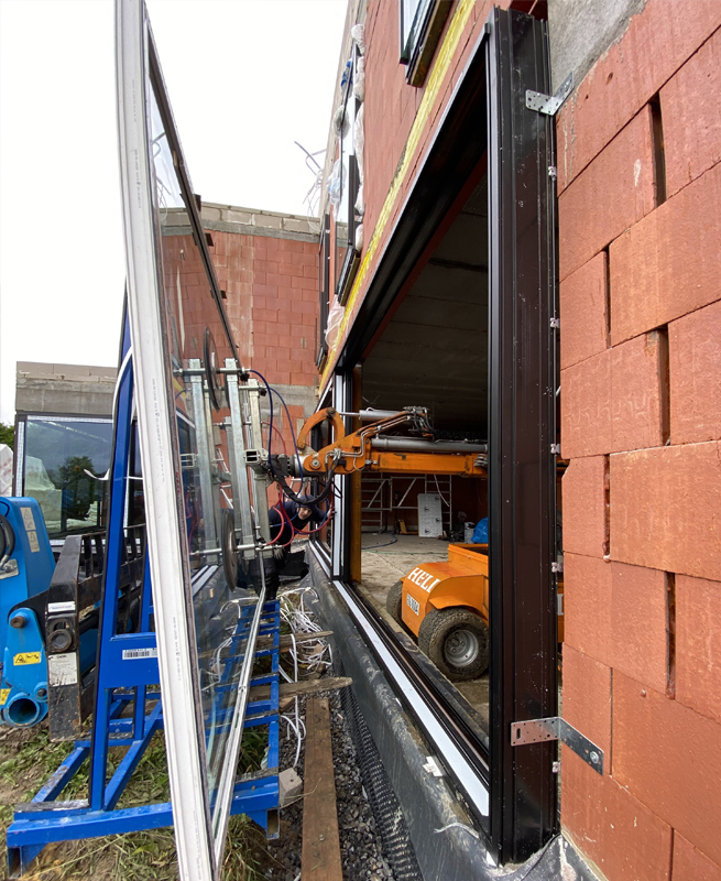 Installation d'une grande porte de terrasse à Fontaine